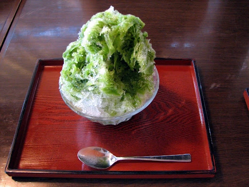 Matcha Kakigori Japanese shaved ice dessert served in a traditional Japanese tray